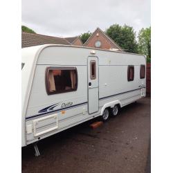 Lunar delta 640ew 2005 4 berth fixed bed twin axle Chris registration document