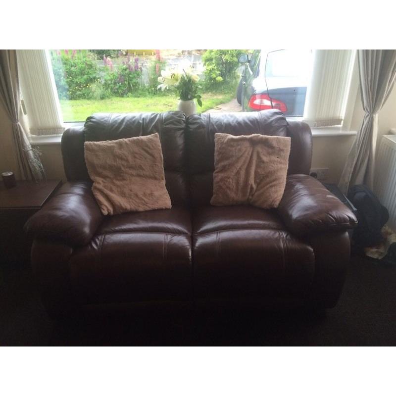 Brown leather reclining 3 and 2 seater settes