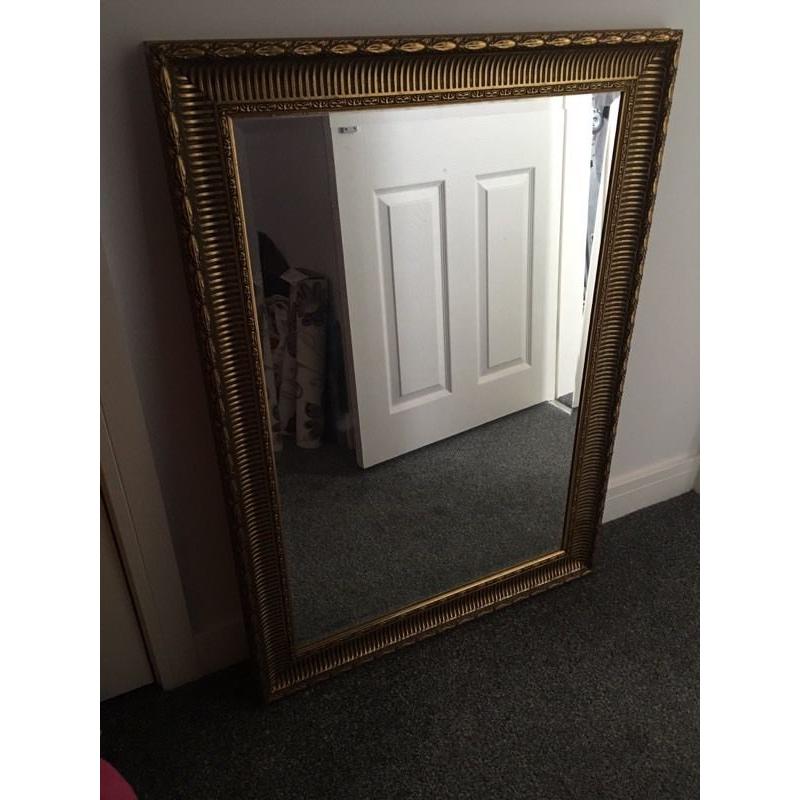 Large gold framed mirror