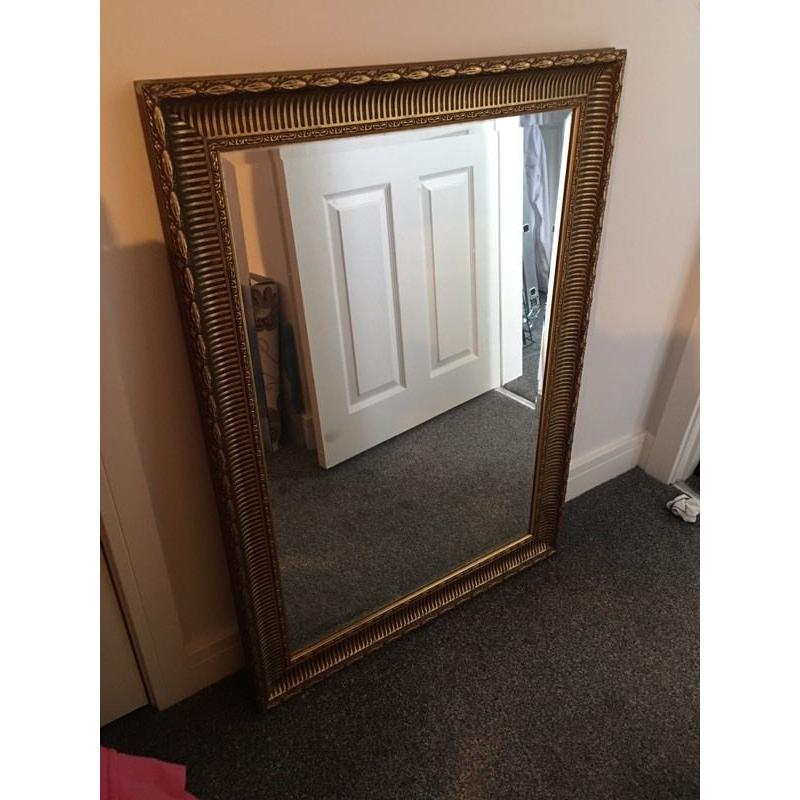 Large gold framed mirror