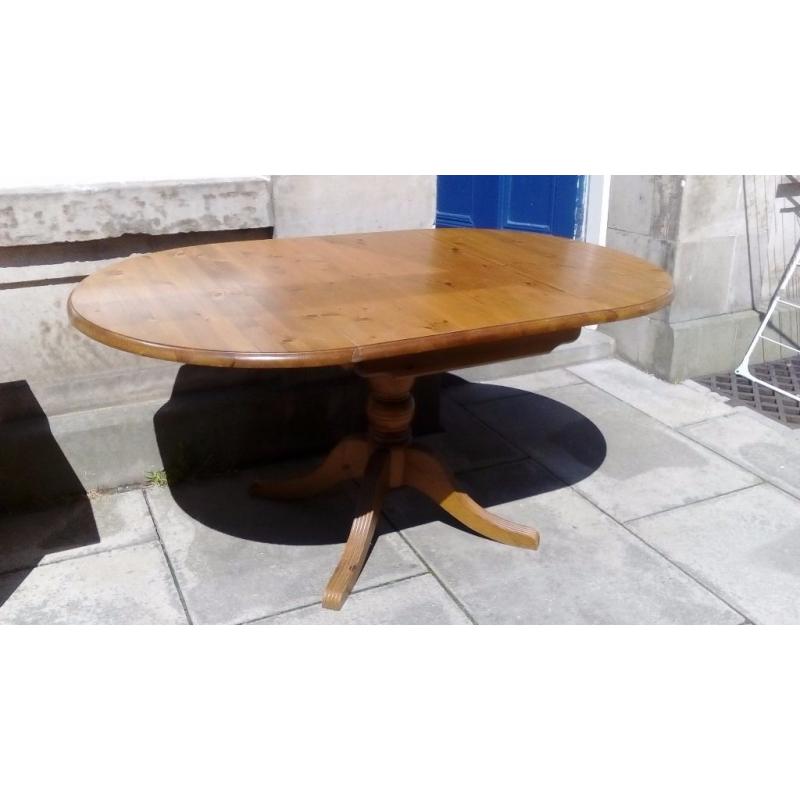 Pine drop leaf dining table with pedestal leg