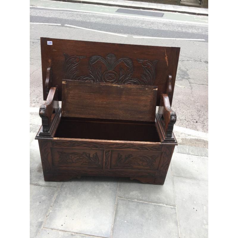 Monk's bench , lovely carved detail , must be seen . Seat lifts up to give storage.