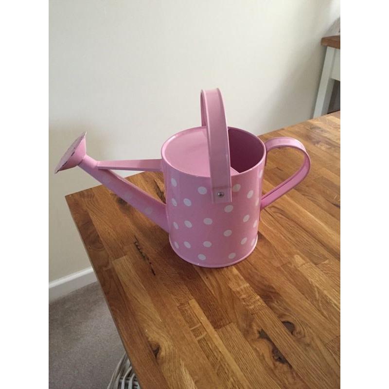 Pink spot watering can