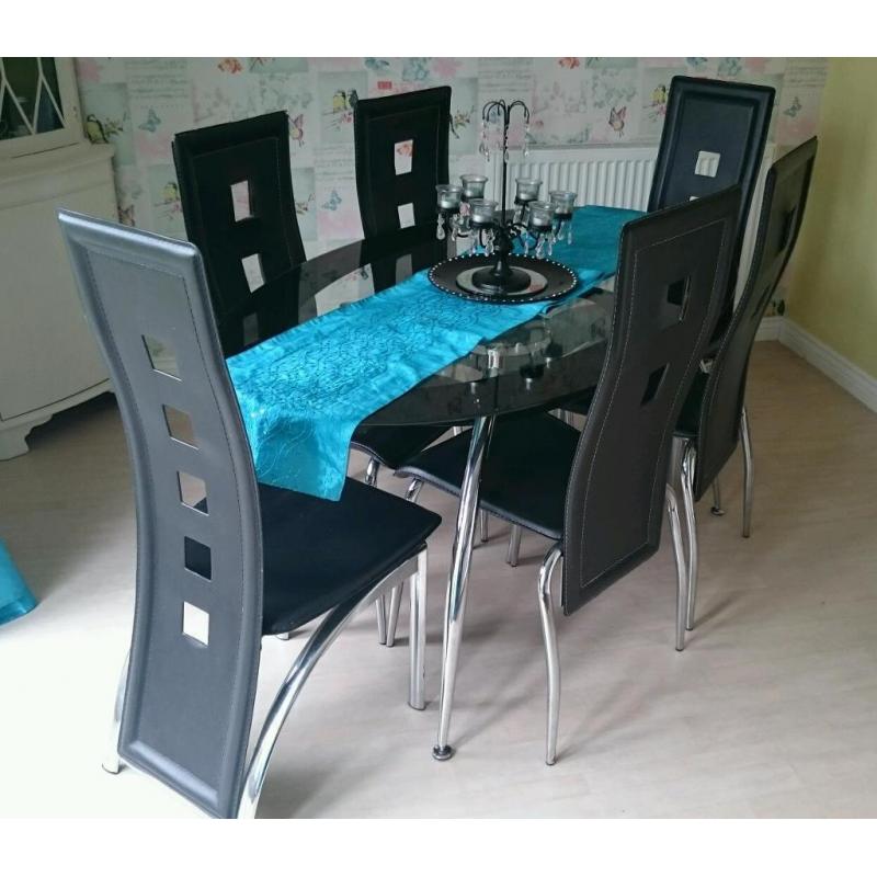 Sold pending Collection - Glass table with 6 chairs