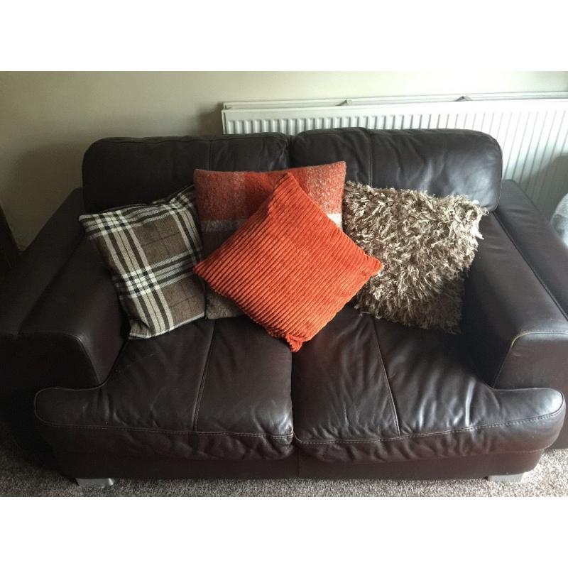 Brown real leather 3 seater, 2 seater and puffee for sale.