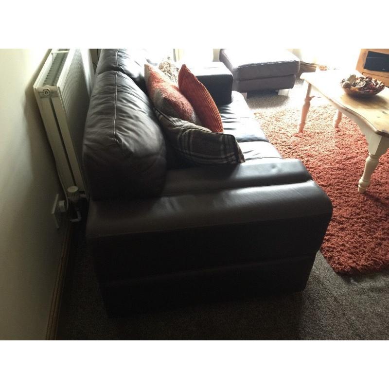 Brown real leather 3 seater, 2 seater and puffee for sale.