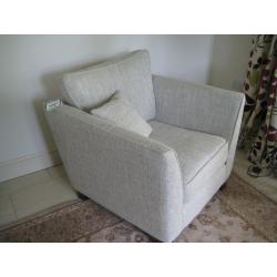 Armchair and Snuggler settee.