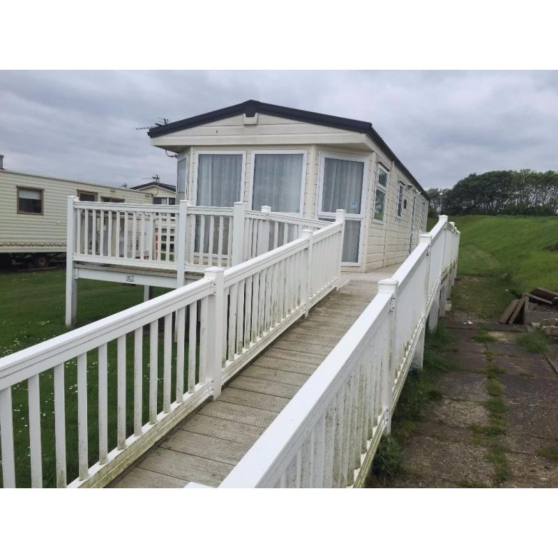 MONTHLY OPTION ON THIS STATIC CARAVAN AT SANDY BAY HOLIDAY PARK WITH DIRECT BEACH ACCESS LOW FEES