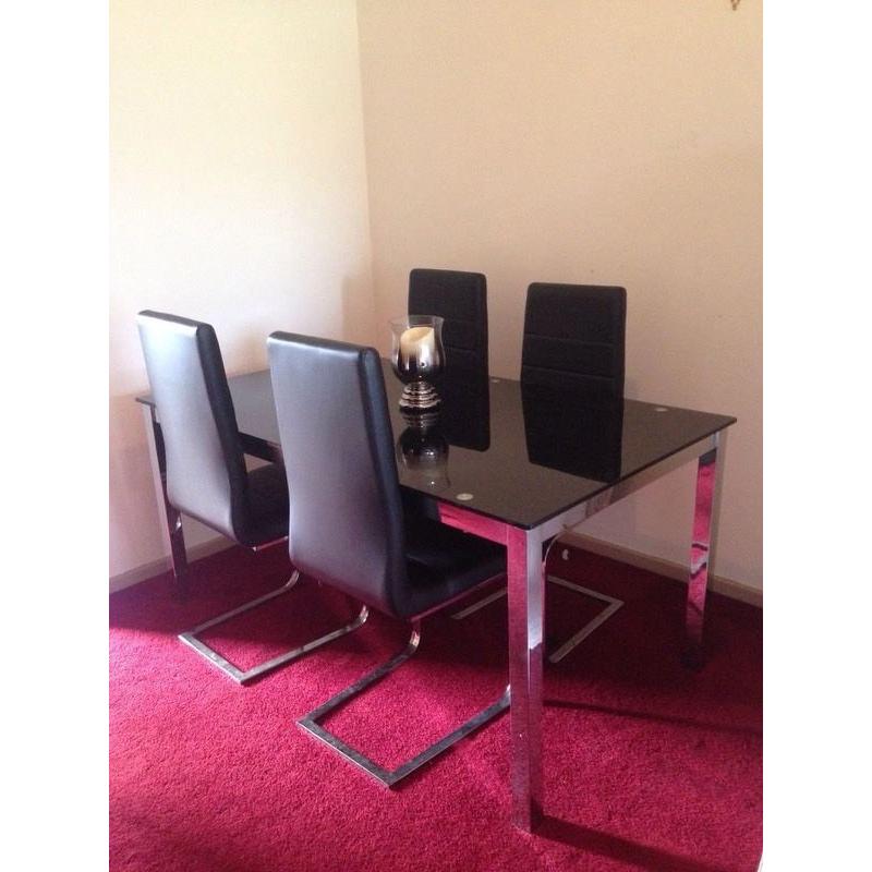 Four Seater Dining Table and Chairs