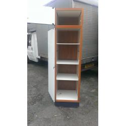 7ft tall white cupboard with shelves. Good condition.