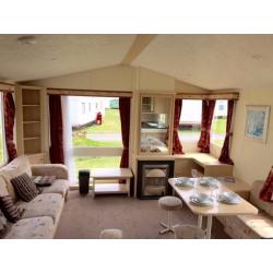 HEATED 2 BED FAMILY STATIC CARAVAN FOR SALE AT SANDY BAY HOLIDAY PARK OPEN 12 MONTHS LOW SITE FEES