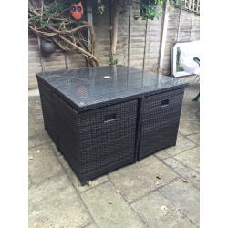 Wicker glass top table with 4 chairs and stools