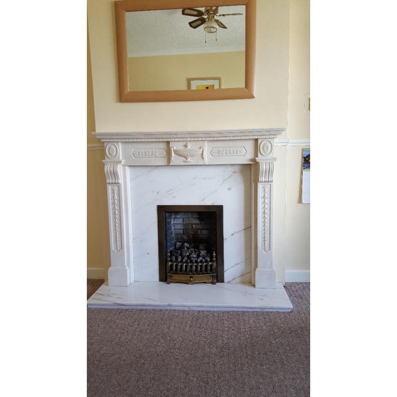 Fire surround Marble with coal fire effect Gas operated can be changed to Electrick