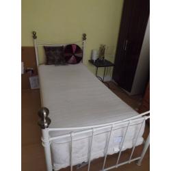 Single bed with mattress and topper