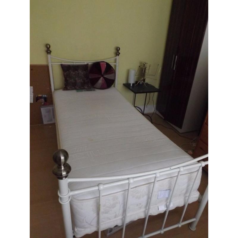 Single bed with mattress and topper