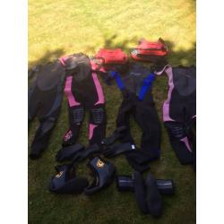 C-skins wet suits and life jackets for teenagers various sizes will split