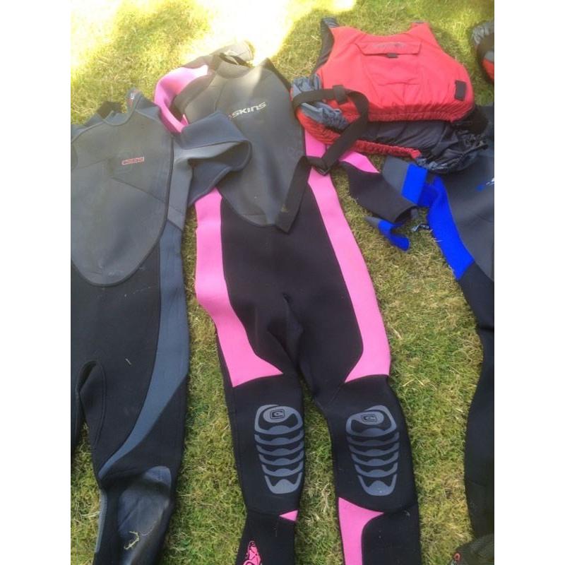 C-skins wet suits and life jackets for teenagers various sizes will split