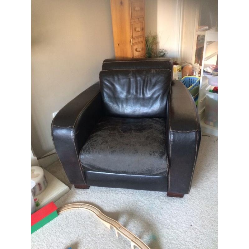 Dark brown leather armchair