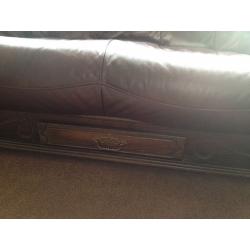 2 Two seater leather sofas plus footstool