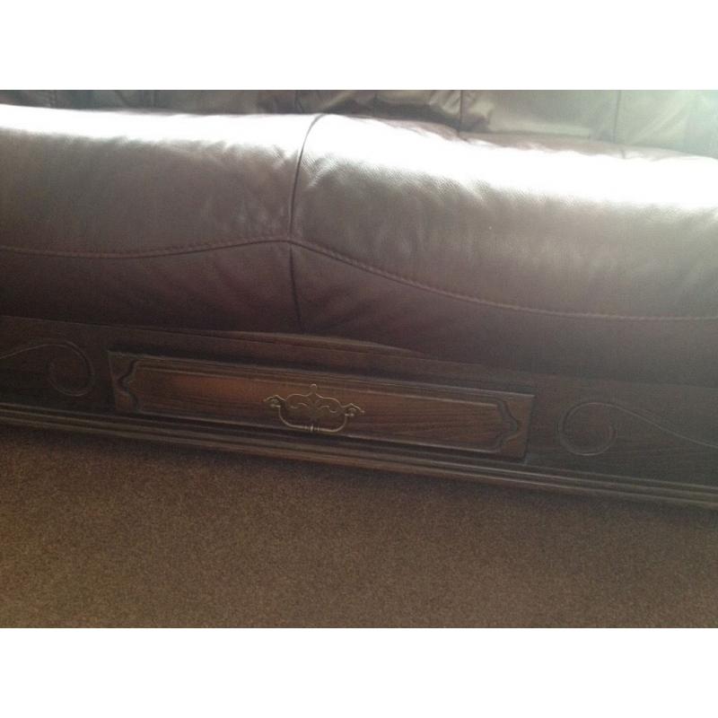 2 Two seater leather sofas plus footstool