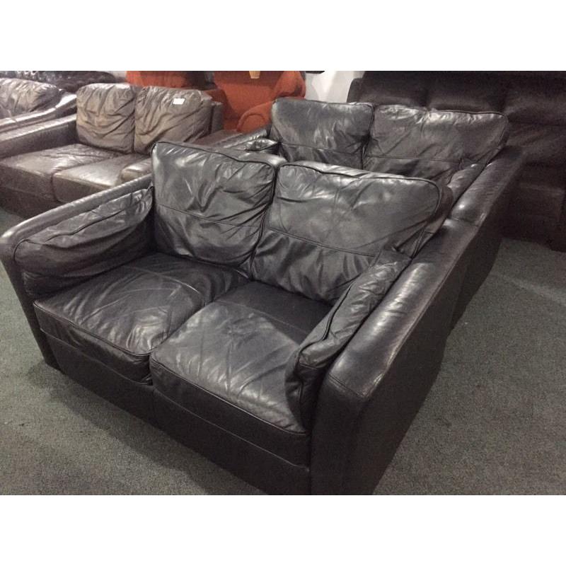 2 black leather 2 seater sofas