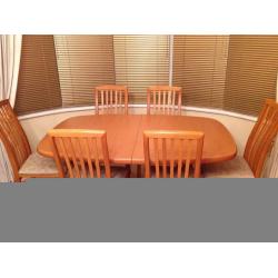 Light oak Dining table and chairs