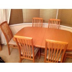 Light oak Dining table and chairs