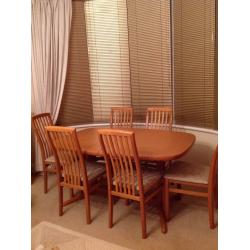 Light oak Dining table and chairs