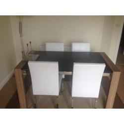 Black glass dining table and chairs