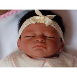 Ethnic reborn baby doll 19" in length like new