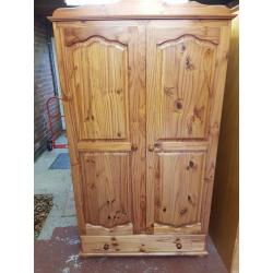 Large pine wardrobe with 1 large drawer. Solid, good condition.