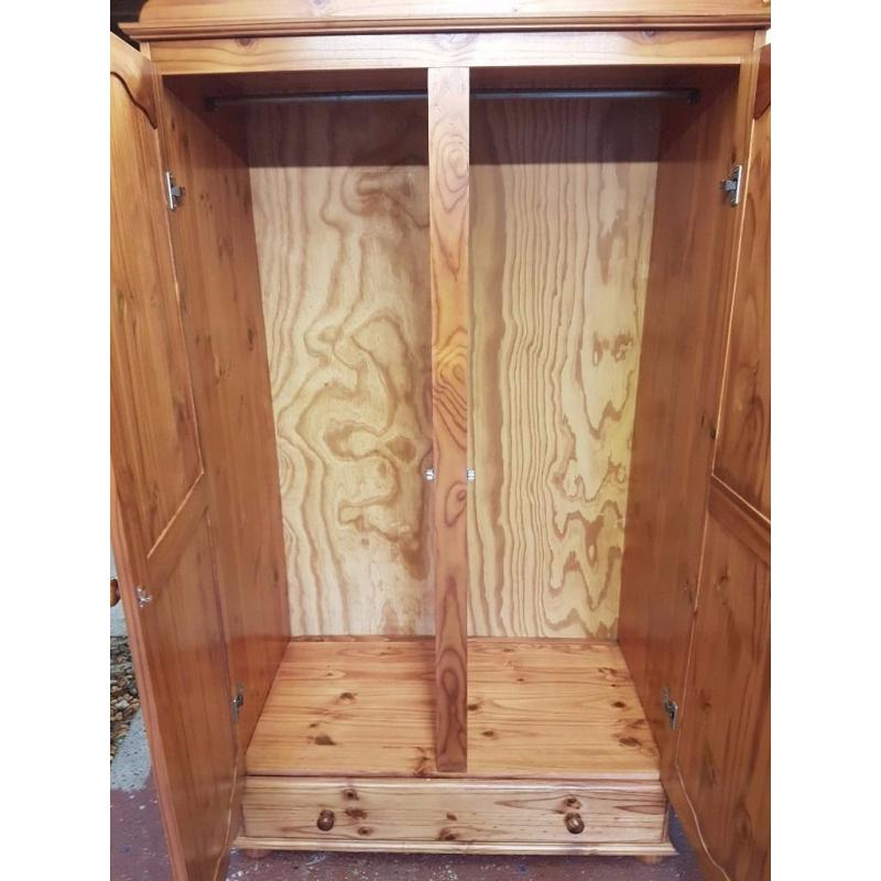 Large pine wardrobe with 1 large drawer. Solid, good condition.