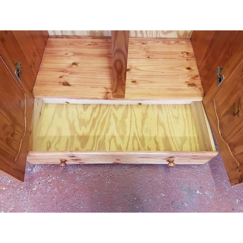 Large pine wardrobe with 1 large drawer. Solid, good condition.