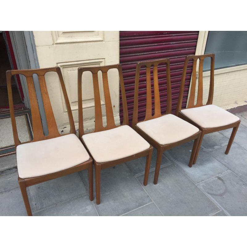 6 x Nathan Teak Dining Chairs , 4 chairs and 2 carver chairs . Free local delivery