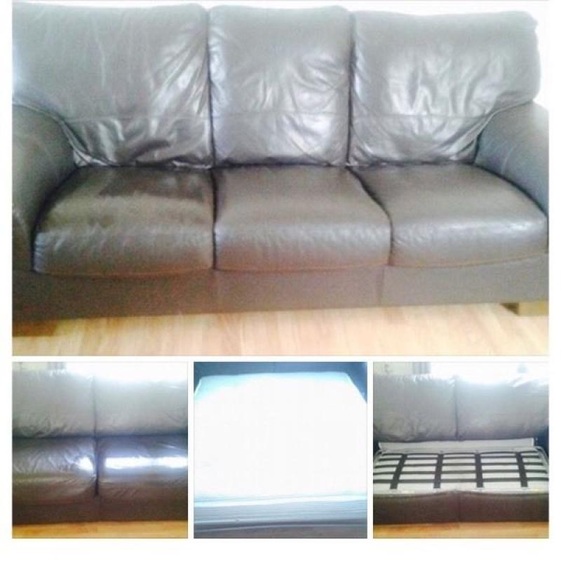 Brown leather 3&2 seater couch. 3 seater is a double sofa bed.