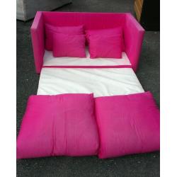 Small pink sofa bed. Good condition.