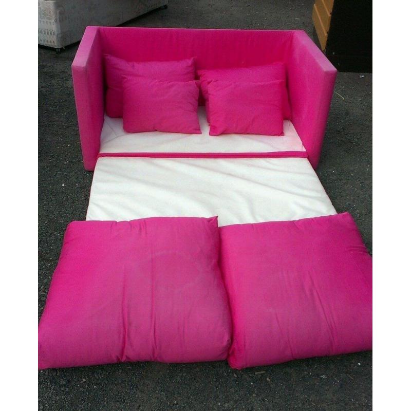 Small pink sofa bed. Good condition.