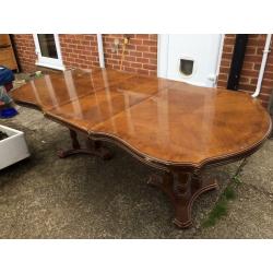 Beautiful sculptured solid wood table and 6 chairs