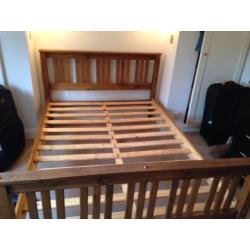 Great condition real wood bed with mattress.