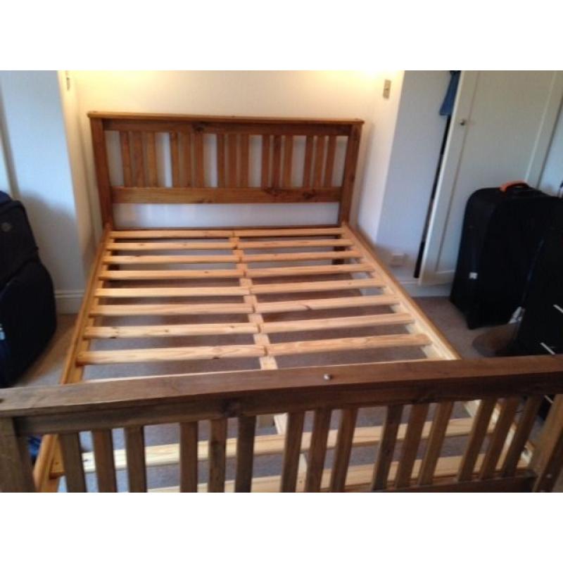 Great condition real wood bed with mattress.