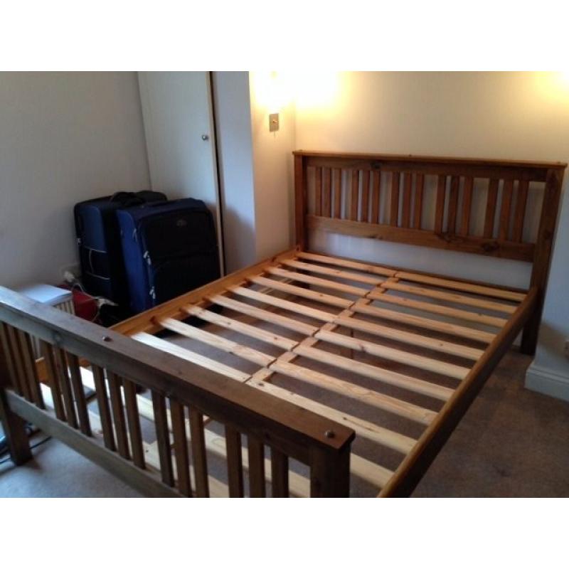 Great condition real wood bed with mattress.