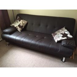 Faux leather black sofa bed (plastic)