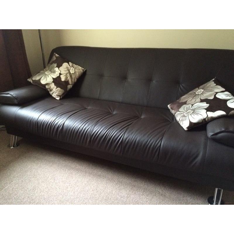 Faux leather black sofa bed (plastic)