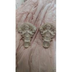 Pair of cherub wall sconces