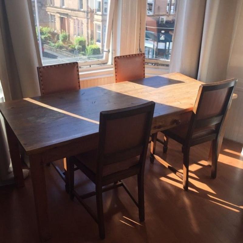 Wooden dining table and 6 chairs