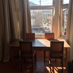 Wooden dining table and 6 chairs