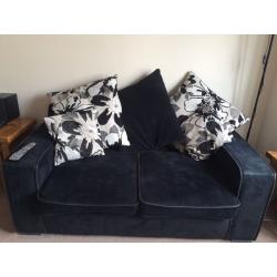 3/4 seater L shaped black couch with matching 2 seater