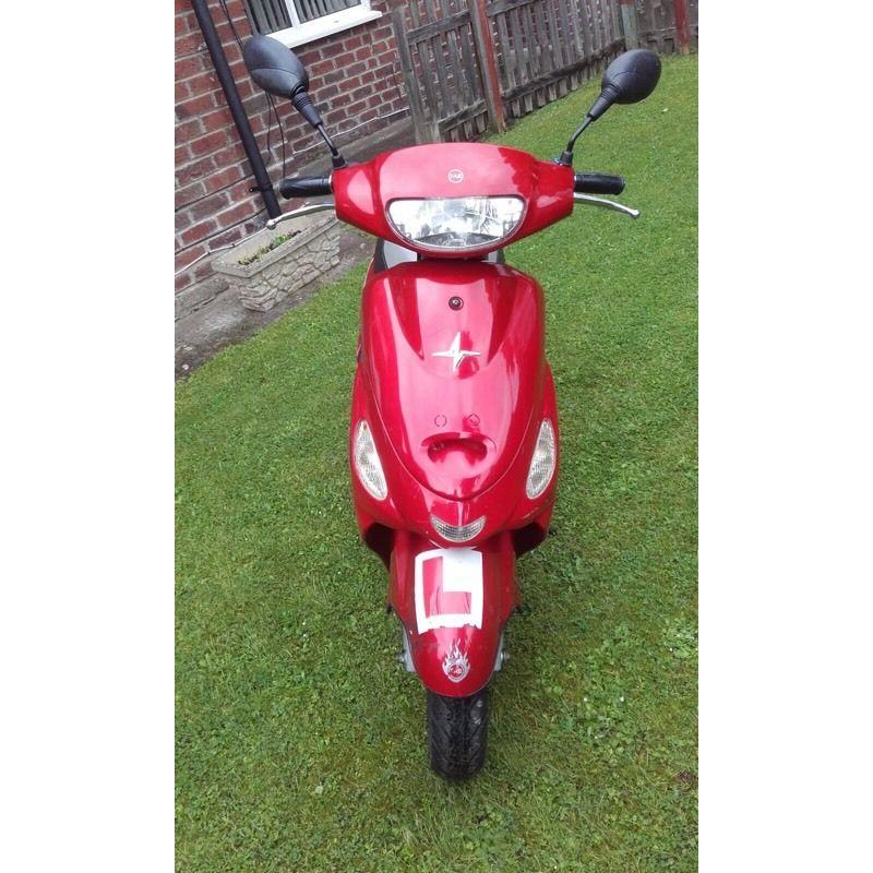 Red pulse moped.