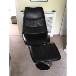 Black leather and chrome effect chair with foot stool