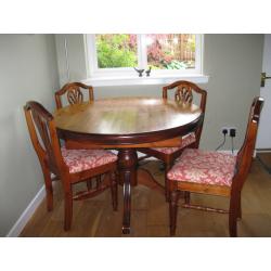 Ercol Extending Dining Room Table & 4 Chairs along with matching Display Cabinet